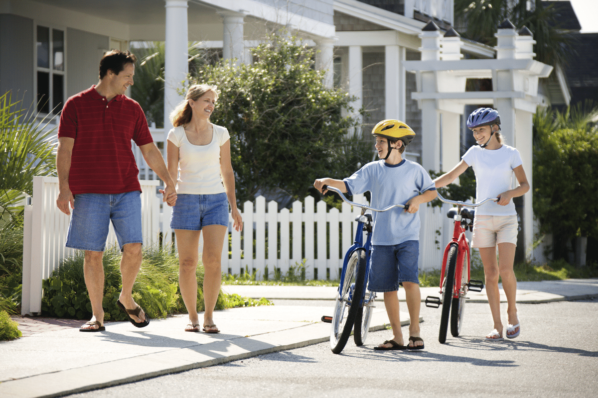 family walking in their neighborhood